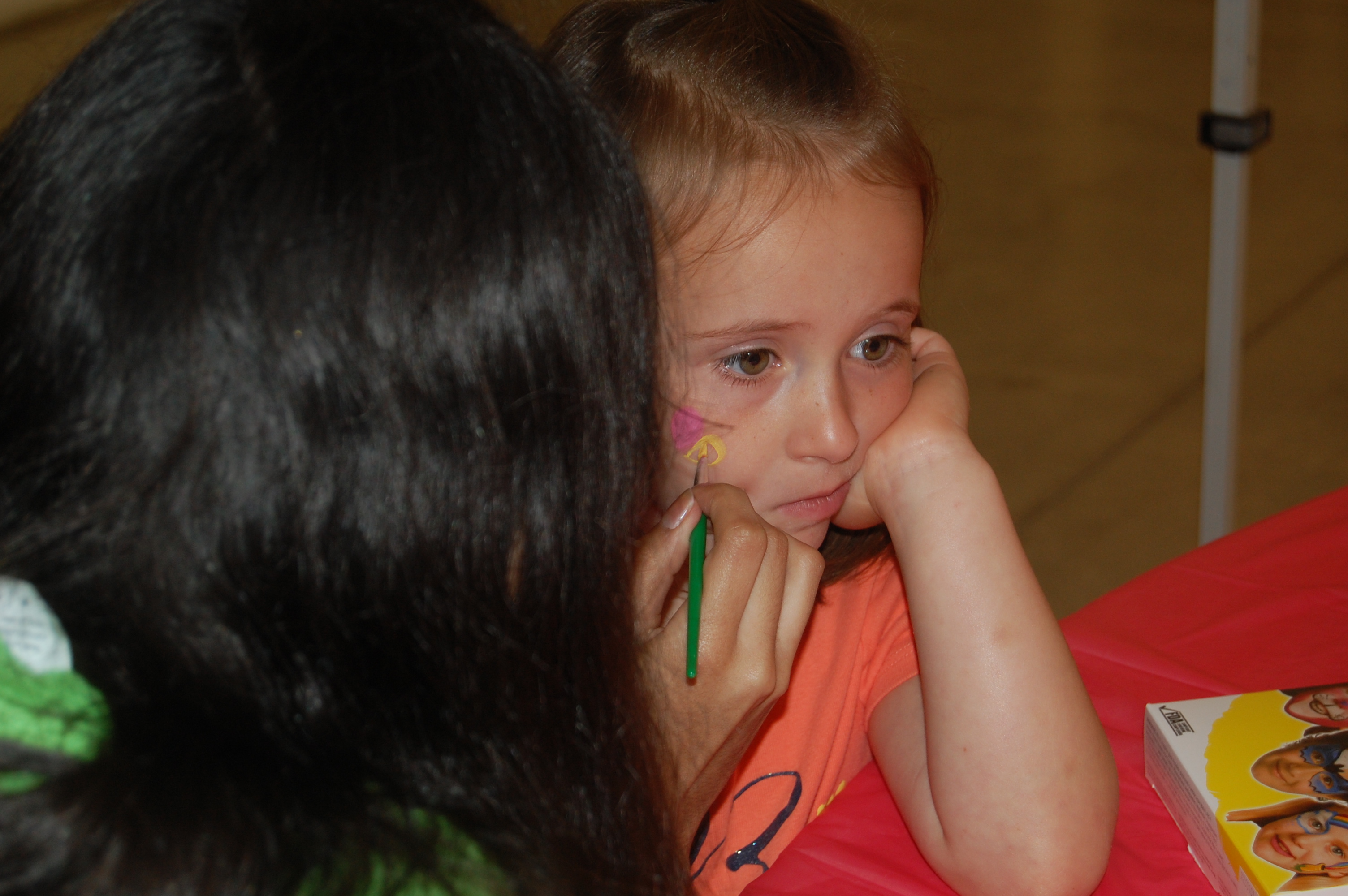 Sayler getting her face painted