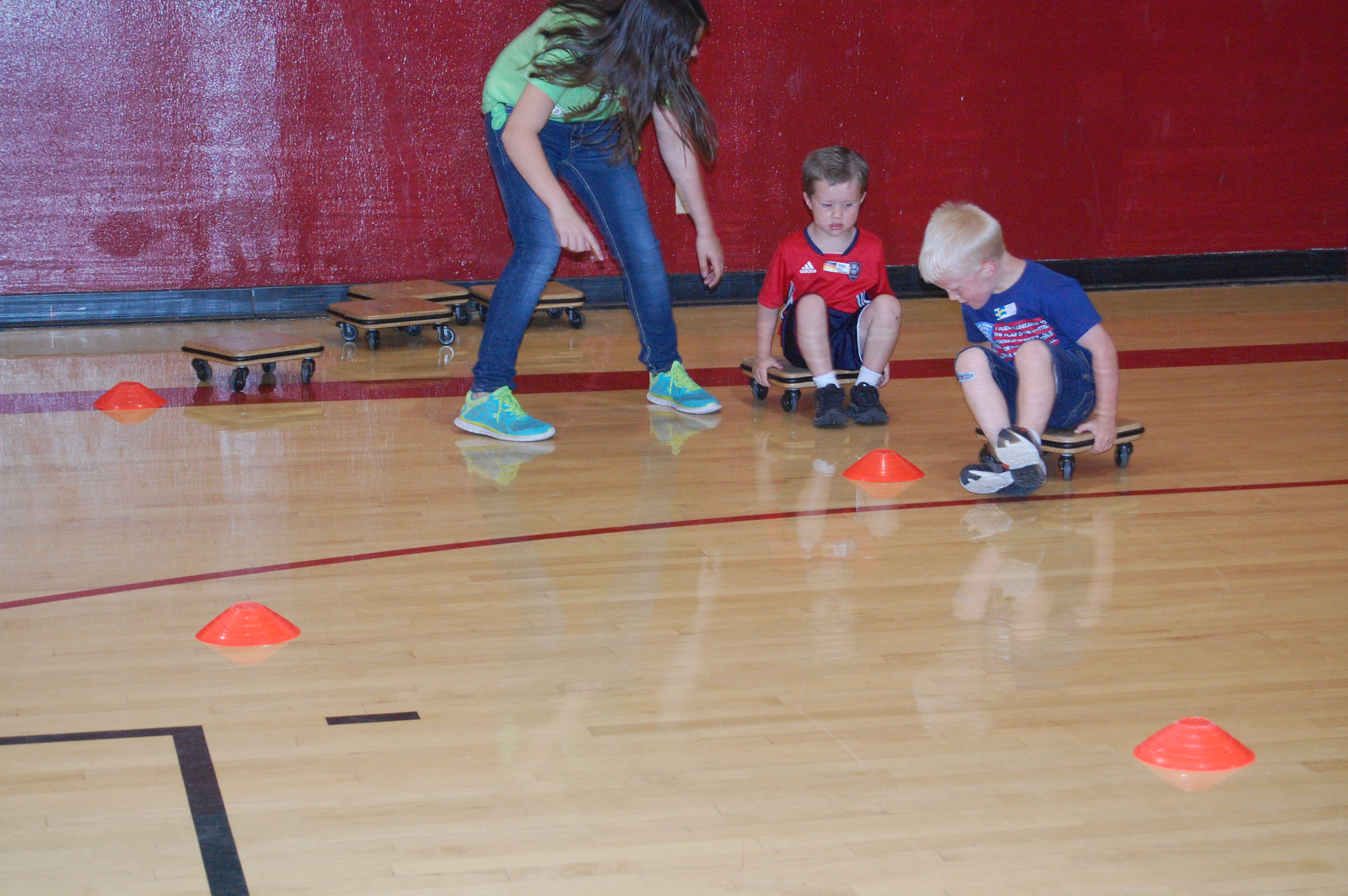 Colton and Conrad on scooters